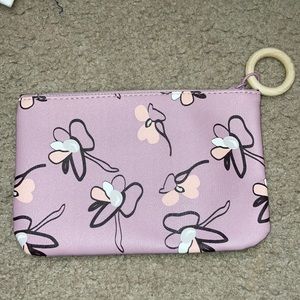 Ipsy women’s purple flower cosmetics Bag